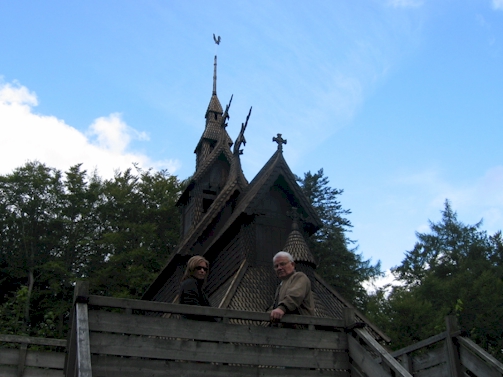 linda and lars before the stave church